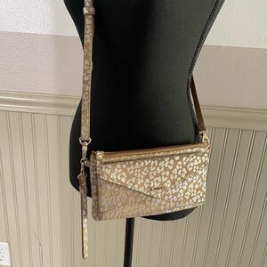 Lodis Gold and Cream Clutch with Elegant Design